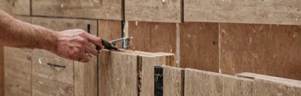 Custom kitchen cabinets being installed